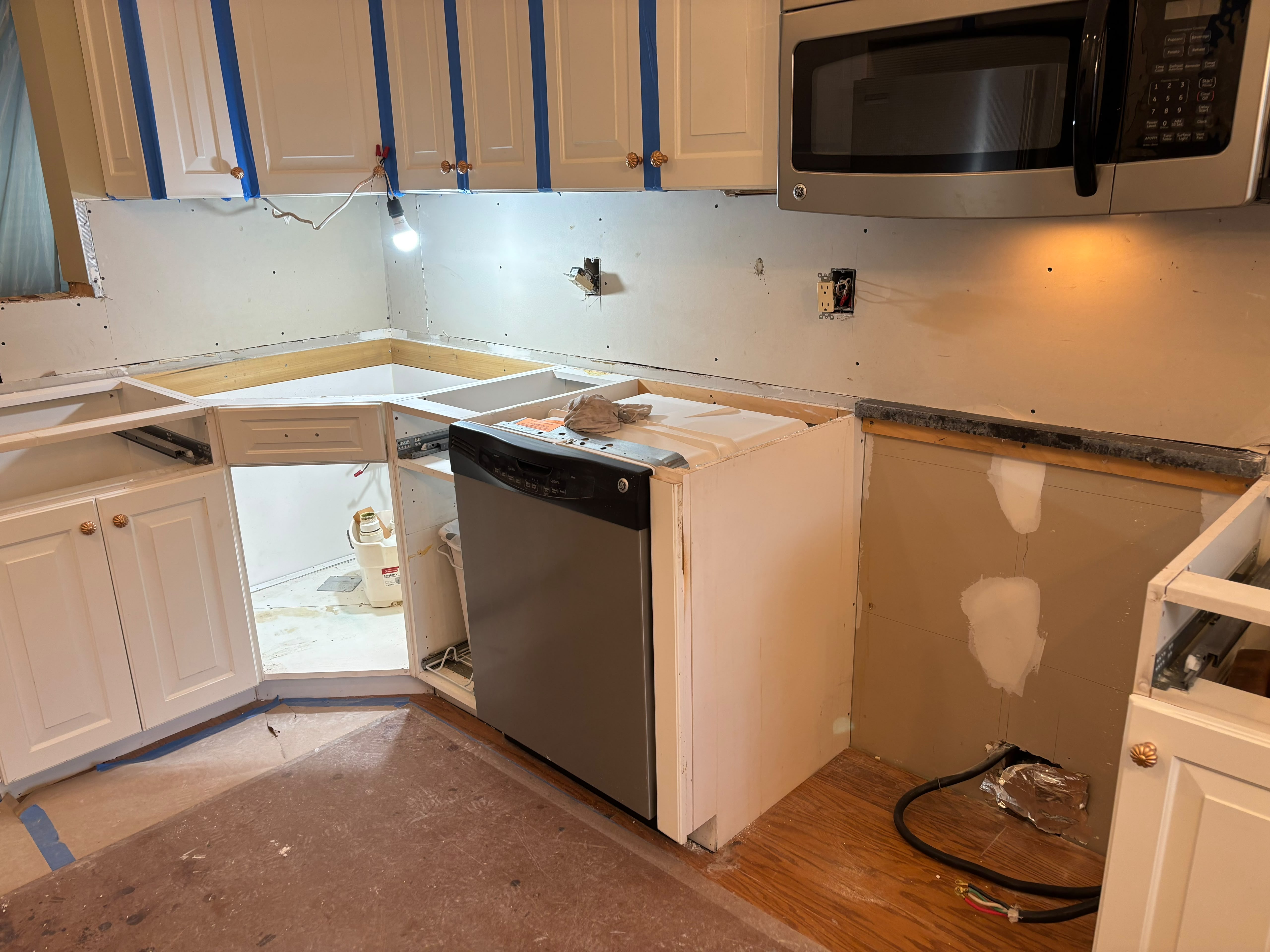 Kitchen cabinets, backsplash and countertop installation in progress, from the Anastos Contractors project gallery
