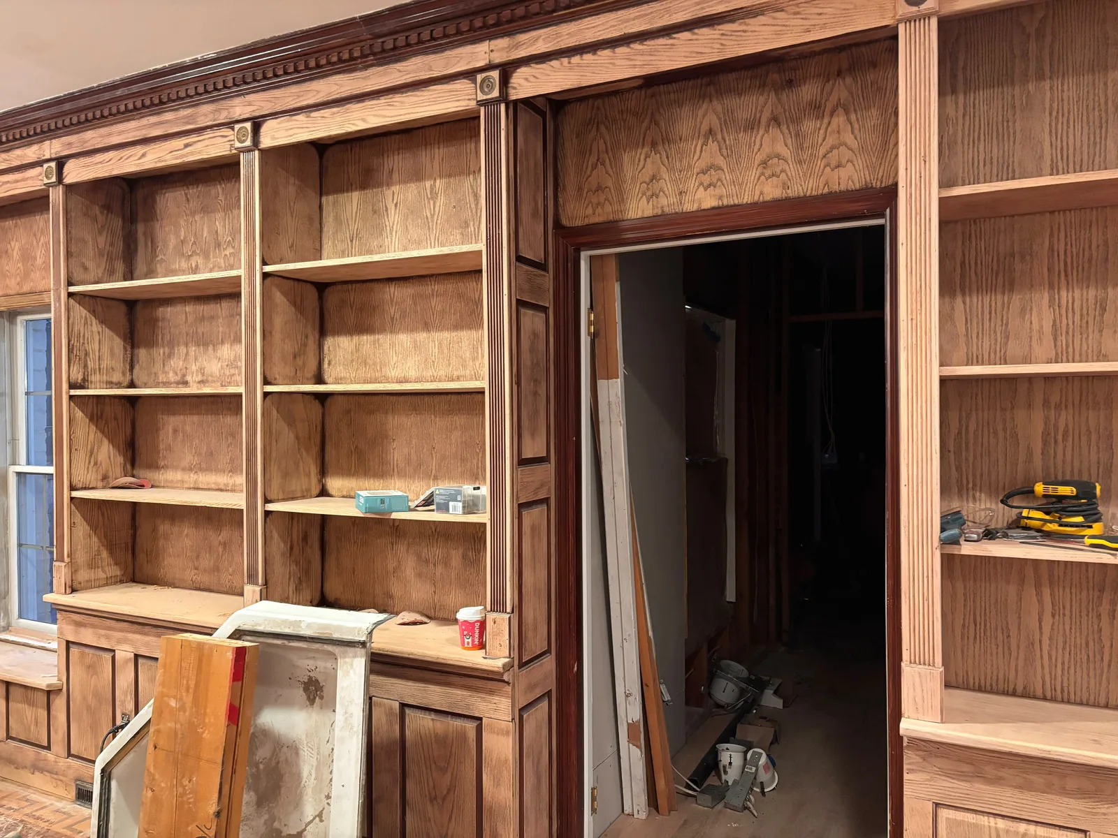 Wood stud wall with horizontal blocking around a rough opening
